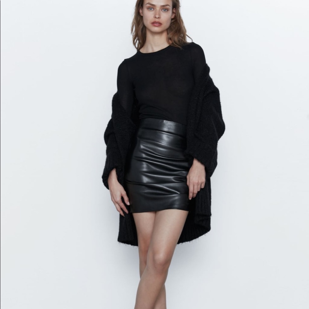 Zara leather ruched skirt with a tag on it